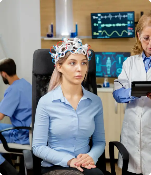 A patient undergoing neurofeedback brain mapping in Tampa to retrain neural "software" following a concussion or stroke.