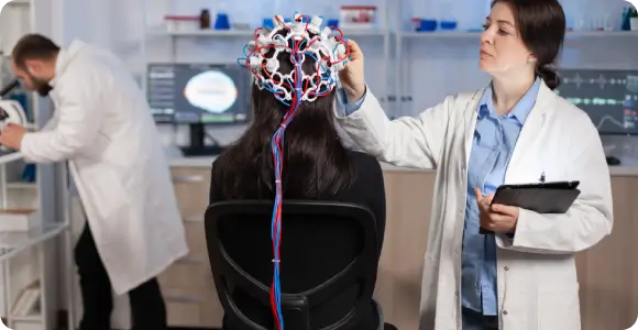 Brain health and neurogenic care supporting healthy neurological signaling A patient undergoing a specialized neurological assessment to support brain health and neurogenic care programs focusing on neurological signaling and neuroinflammation.