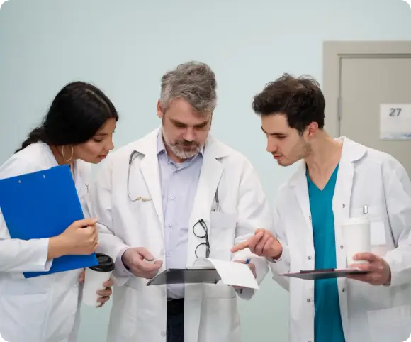 A medical team conducts a clinical review during a comprehensive medical evaluation for advanced regenerative and inflammation-focused care in Tampa and St. Petersburg.