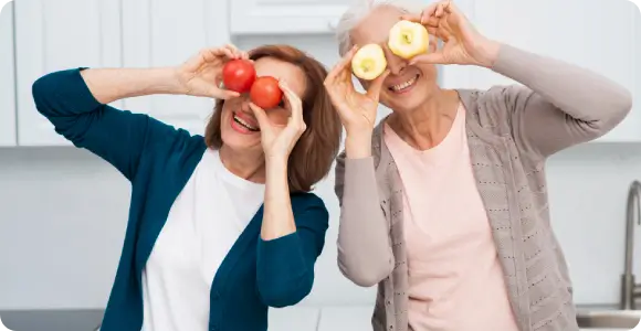 Two physically active women practicing healthy lifestyle habits as part of a personalized longevity and anti-aging medicine program designed for functional independence.